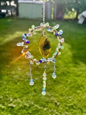 Handmade Suncatcher, with Swarovski crystals and dragons vain.